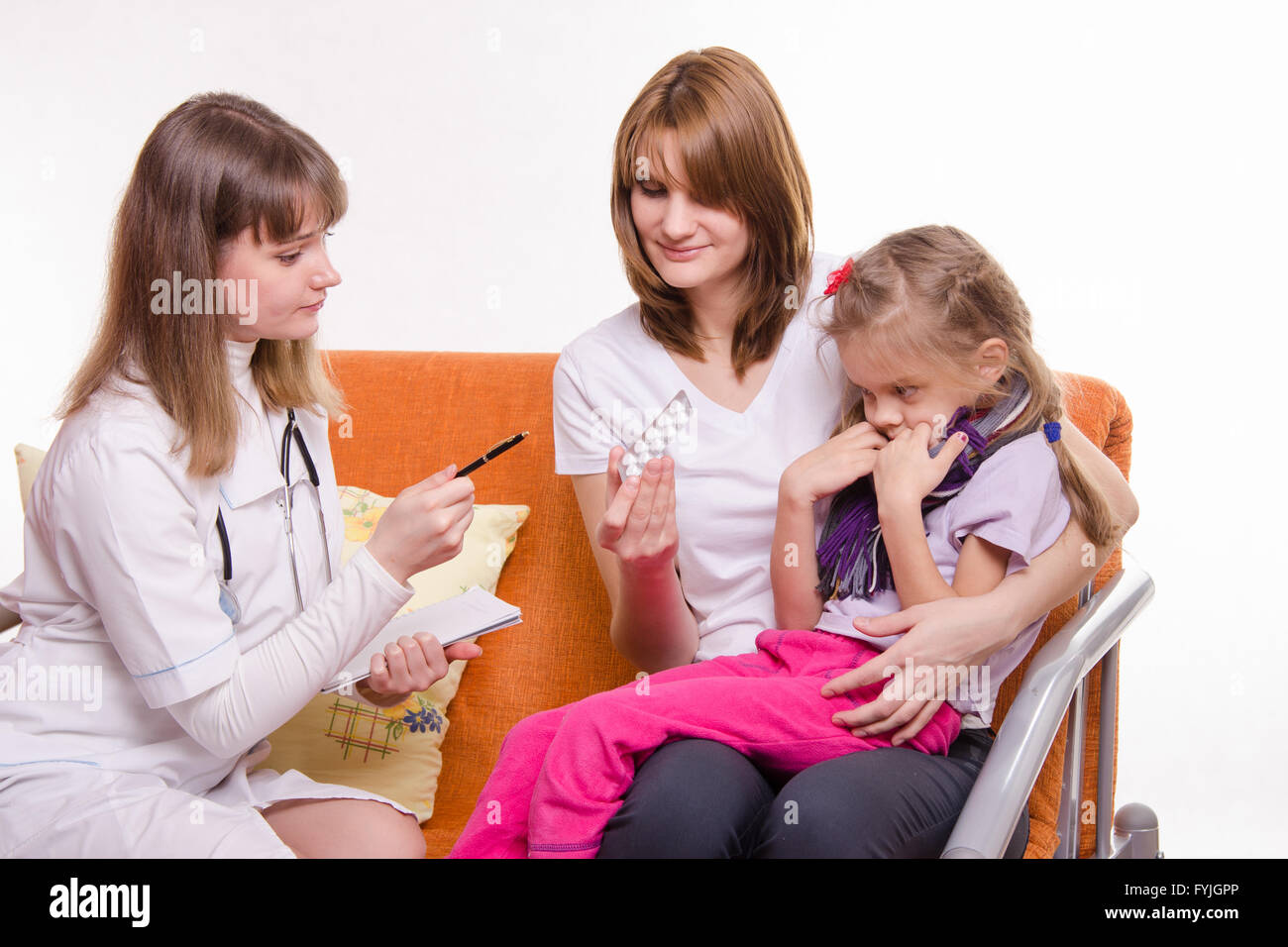The pediatrician tells about medicine mom sick girl Stock Photo