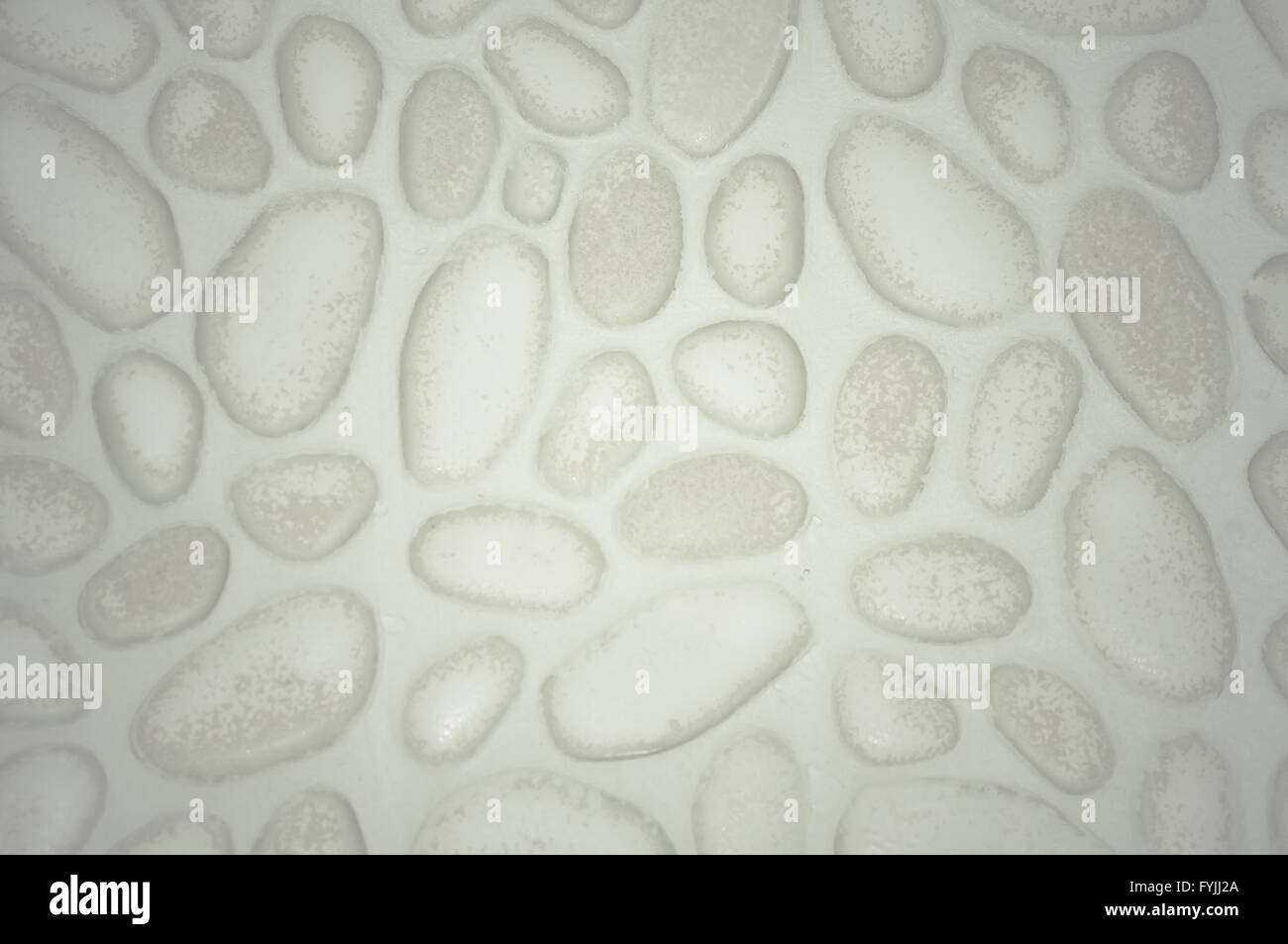 textured stone wall background with small stones a Stock Photo - Alamy