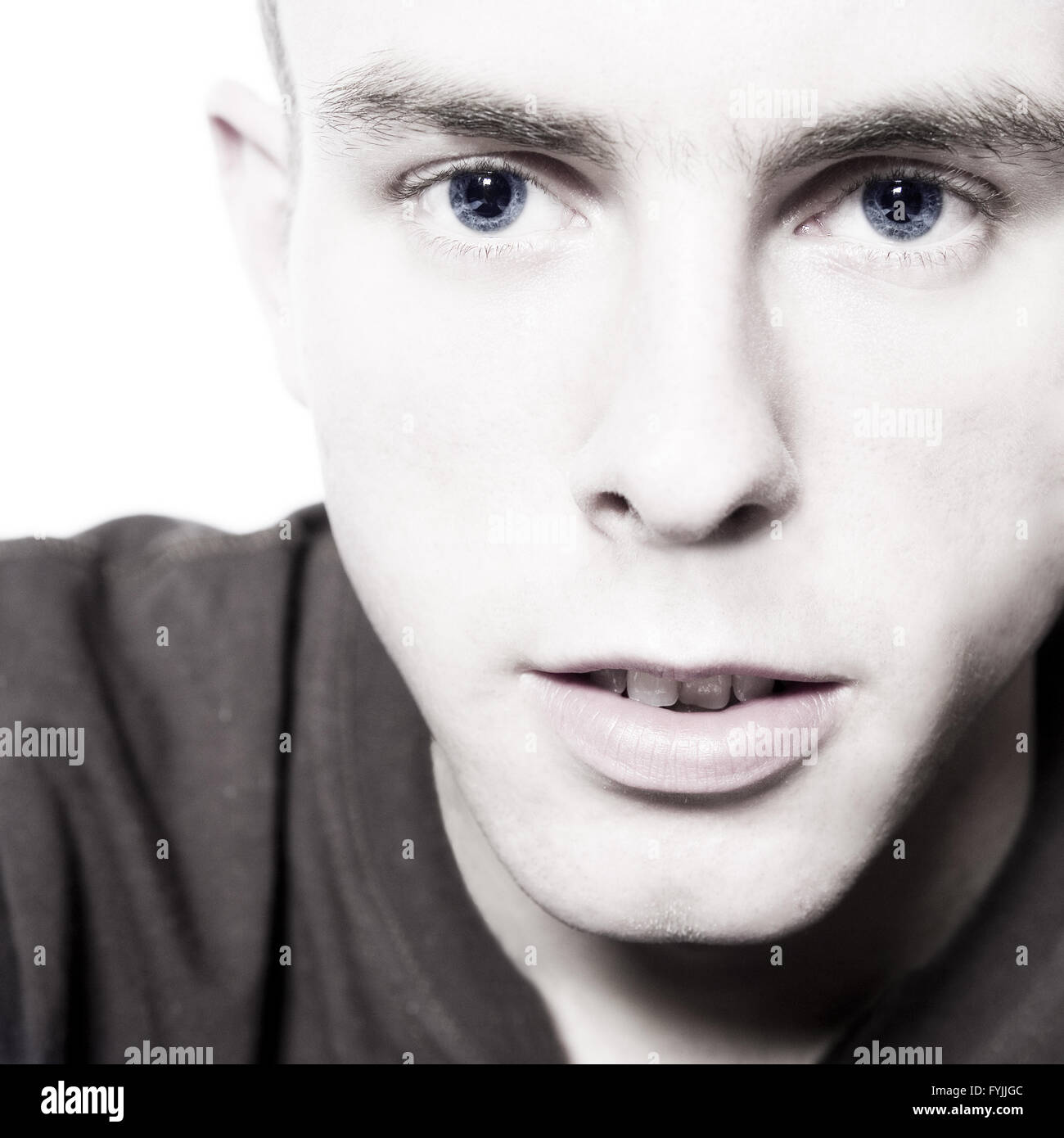 Studio portrait of a young man Stock Photo - Alamy