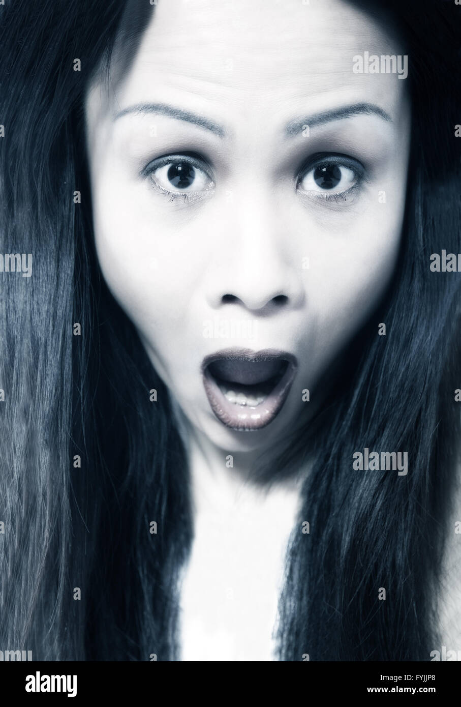 Asian girl being scary Stock Photo