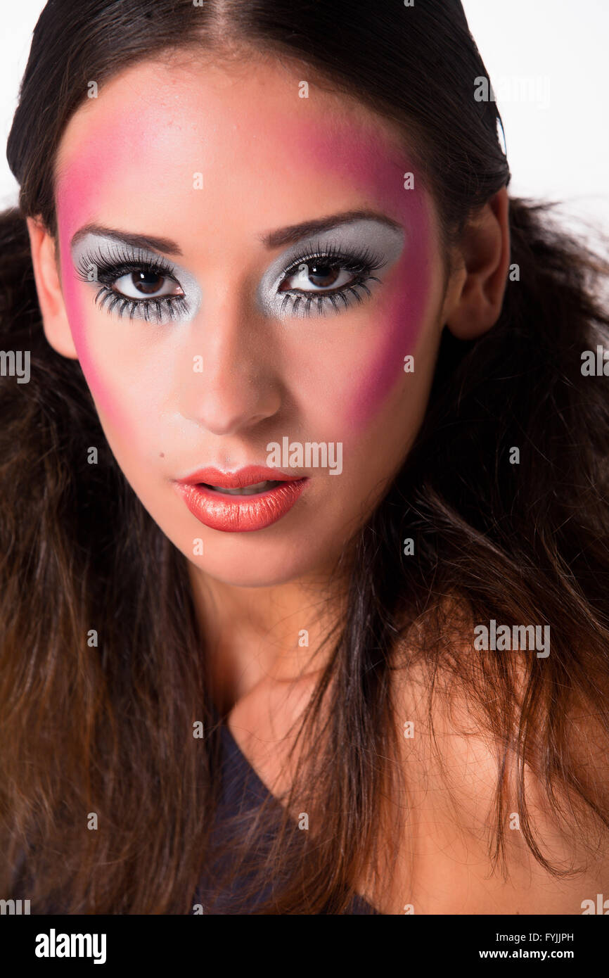 Loving mixed raced girl with extreme make-up Stock Photo