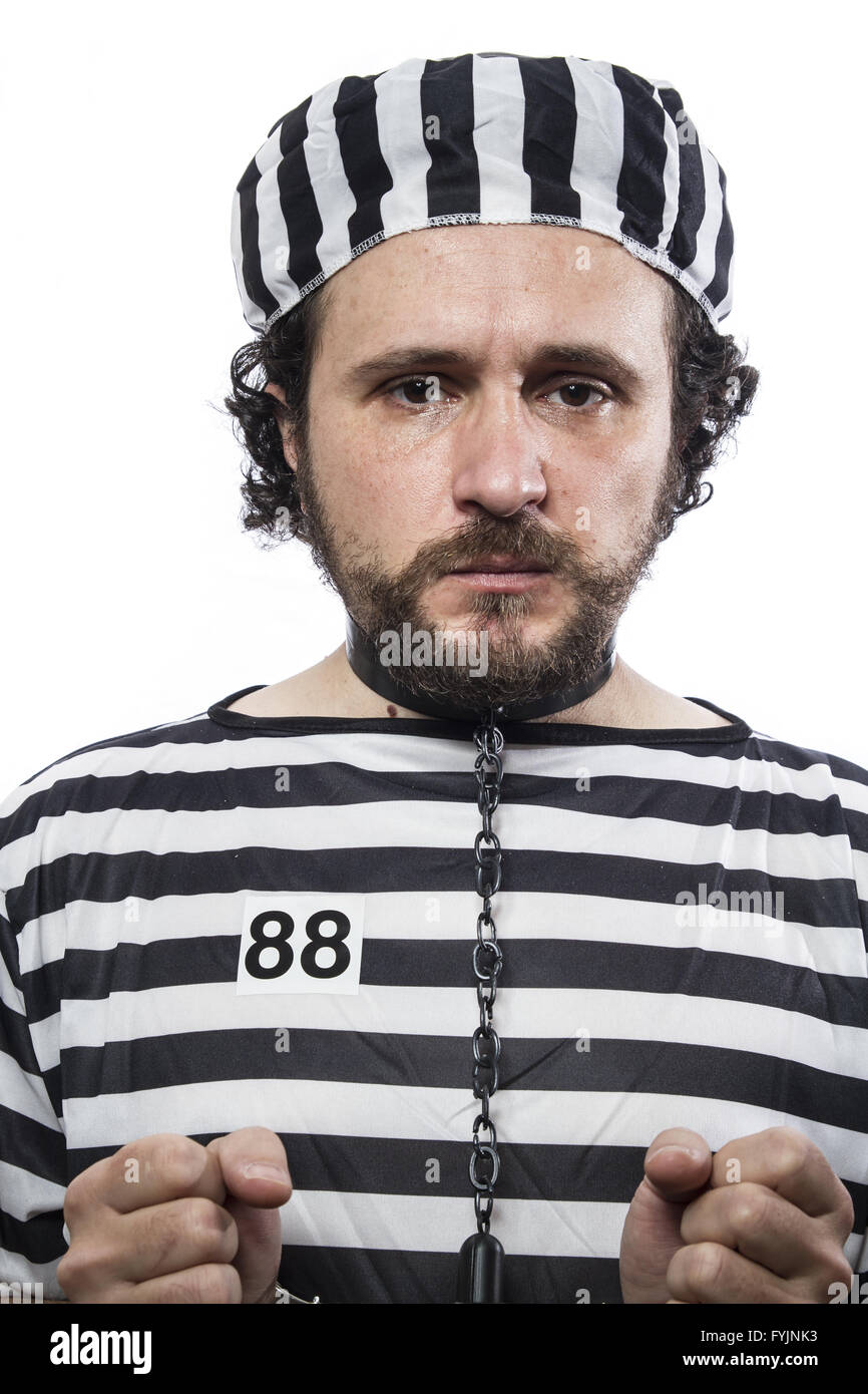Trapped, one caucasian man prisoner criminal with chain ball and