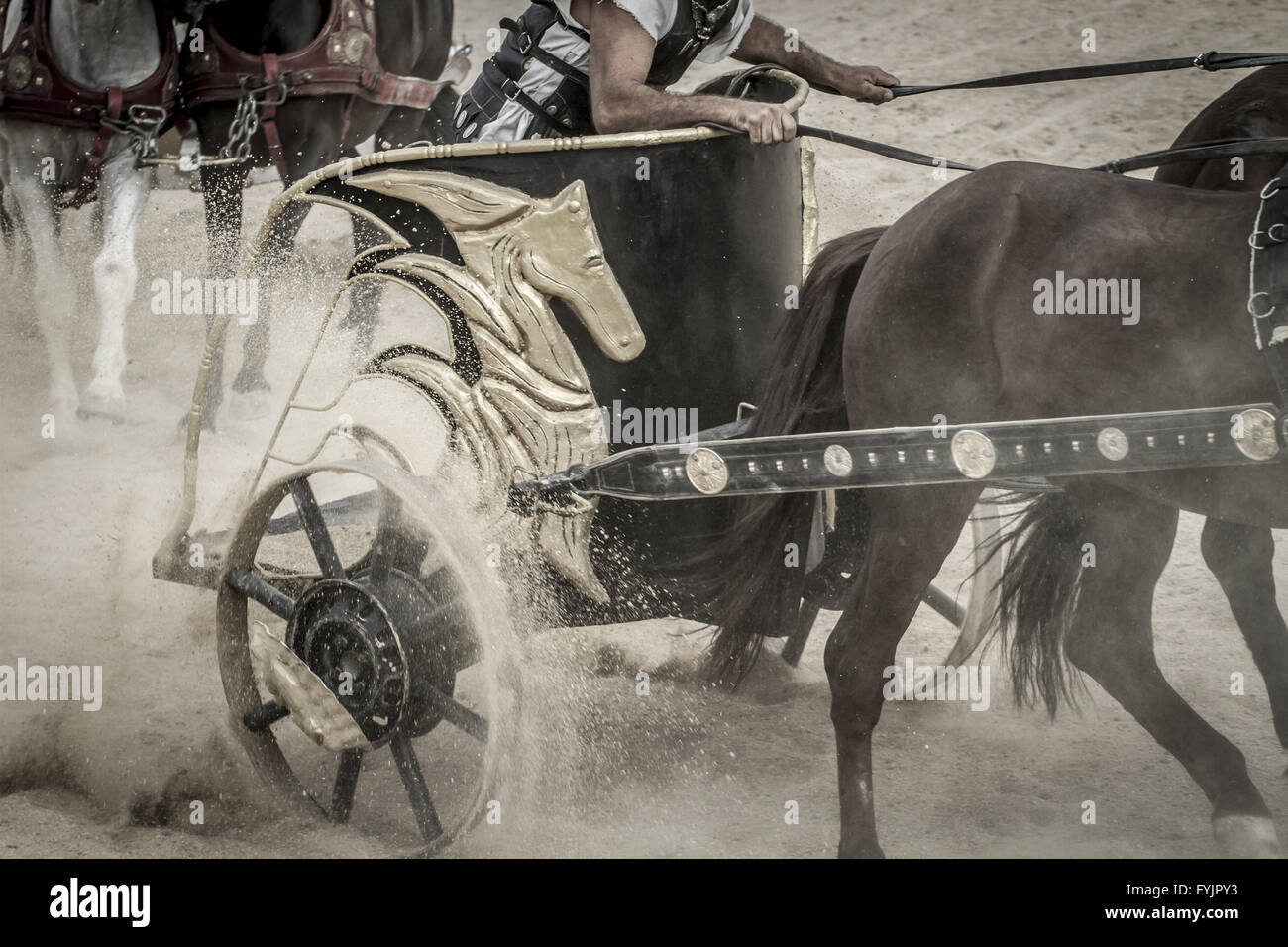 Strong, Roman chariot in a fight of gladiators, bloody circus Stock Photo
