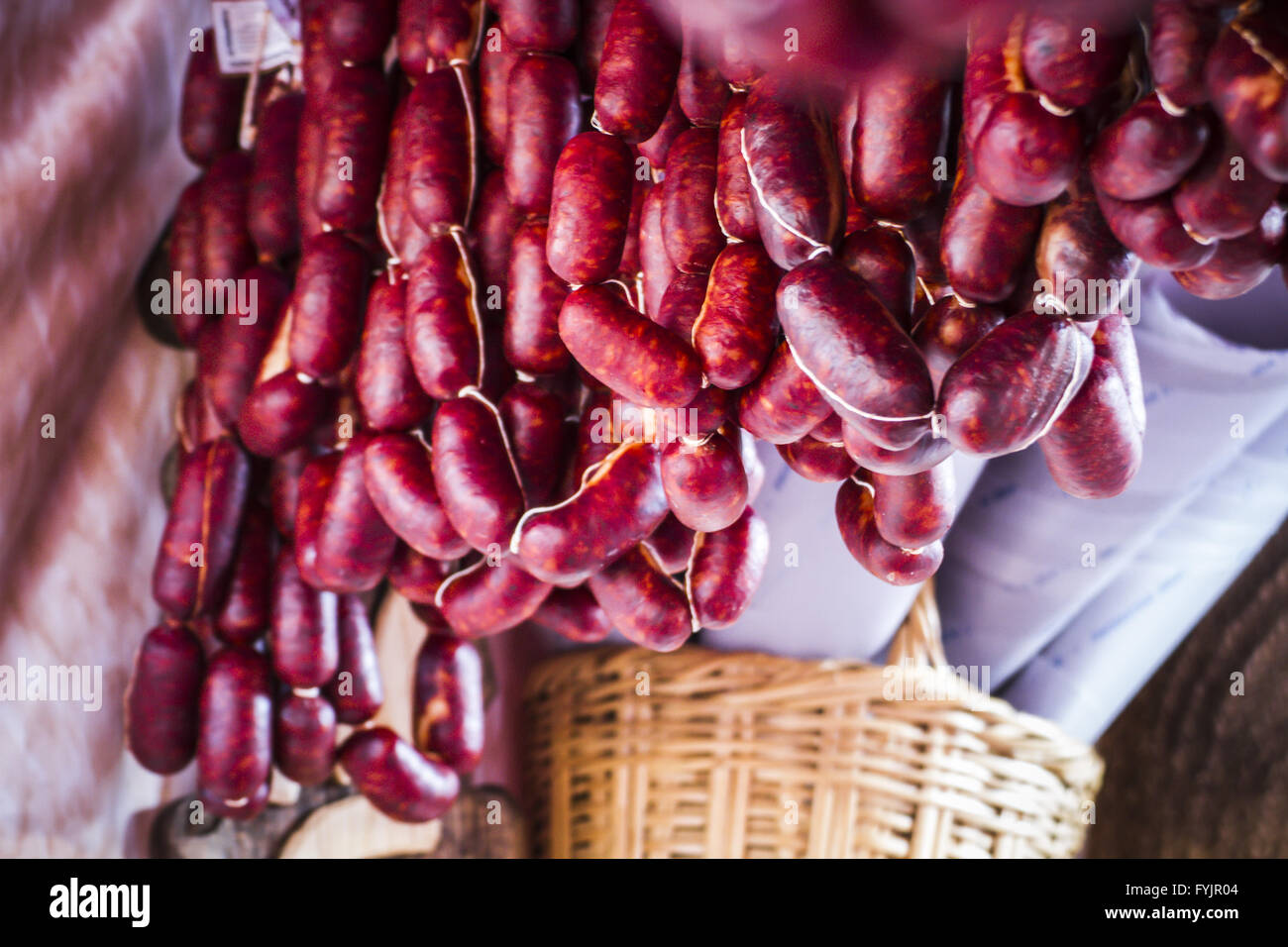 lots of sausages and chorizos in a medieval fair Stock Photo