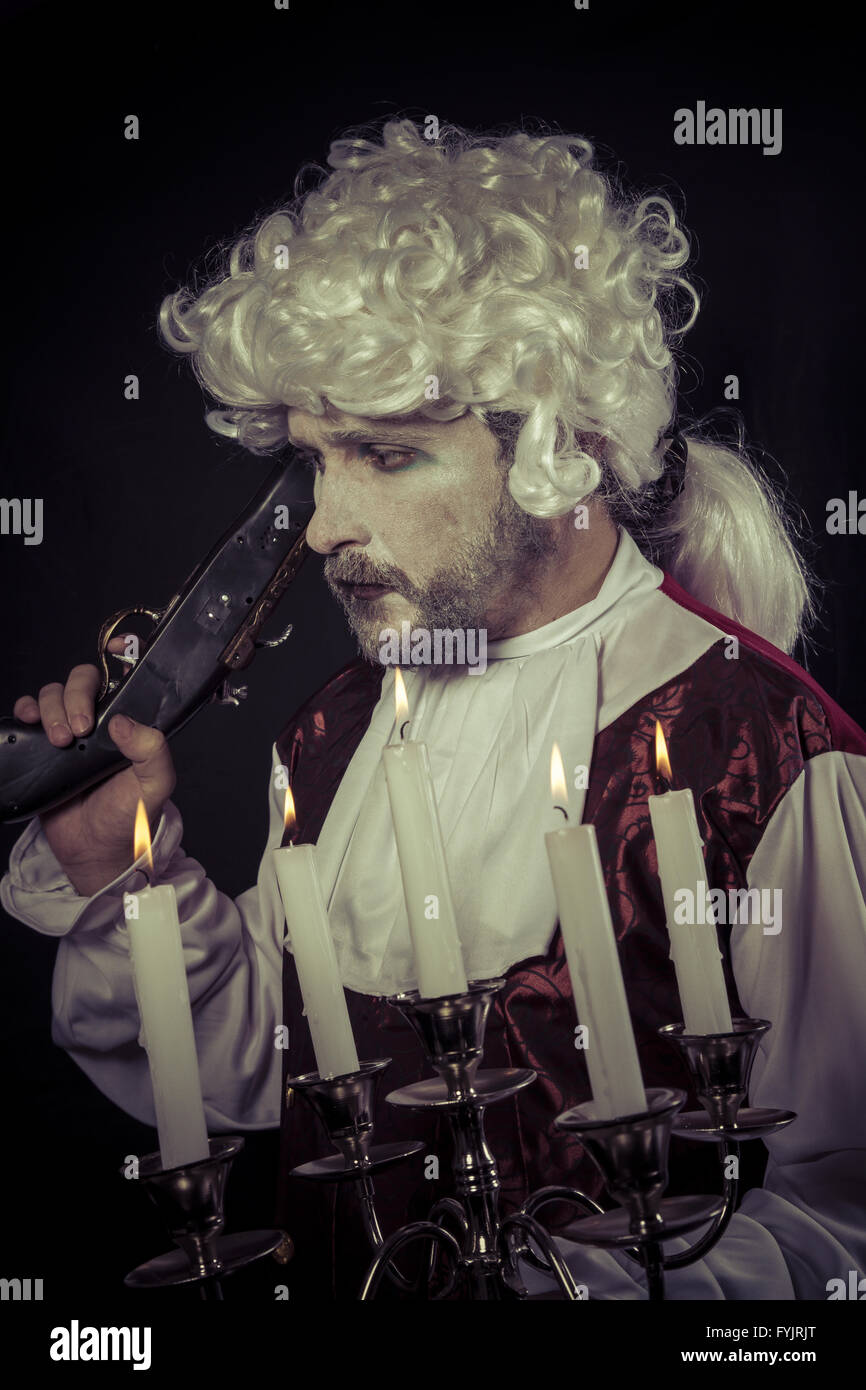Gunfight, nineteenth century man, , chandelier with candles Stock Photo