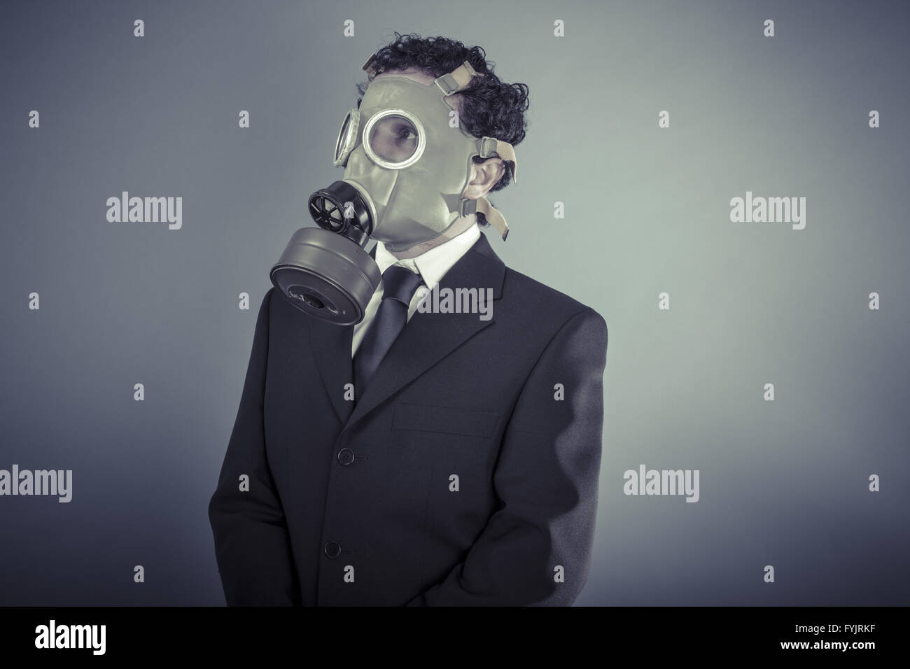 Industry, Business man wearing a gask mask, pollution concept Stock Photo