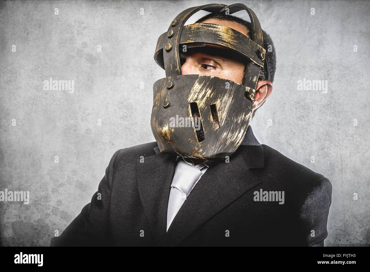 face, dangerous business man with iron mask and expressions Stock Photo