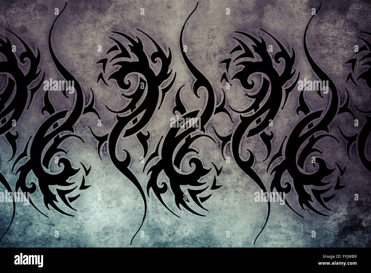 Tribal Tattoo design over grey background. textured backdrop. Artistic