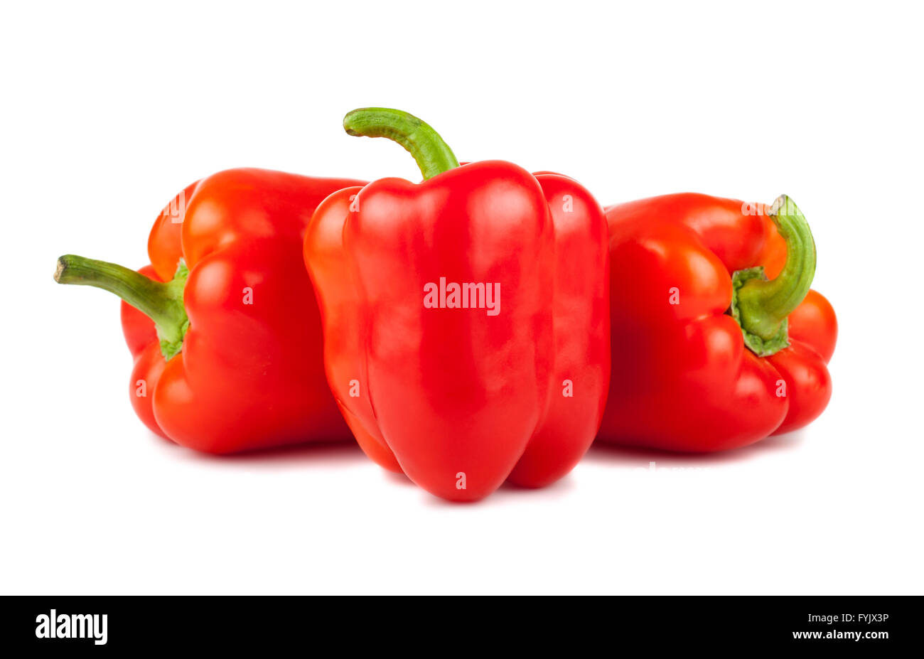 Three red sweet peppers Stock Photo Alamy