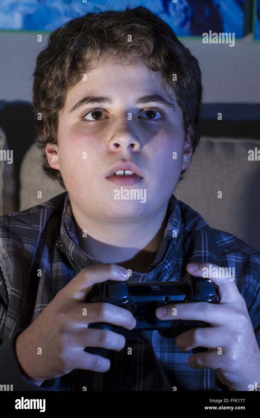 boy with joystick playing computer game at home Stock Photo Alamy