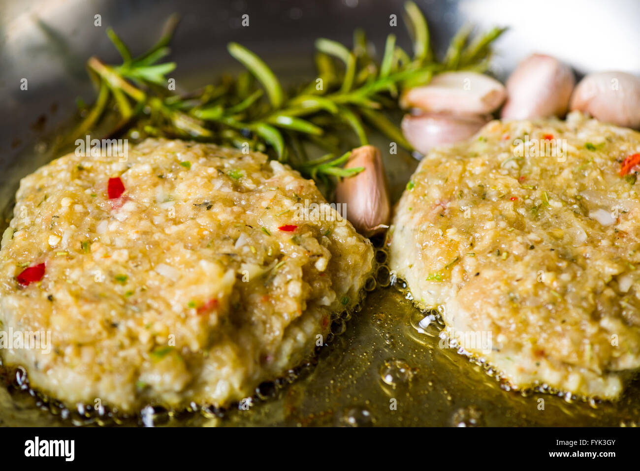 Raw Rissoles two raw chicken rissole Stock Photo - Alamy