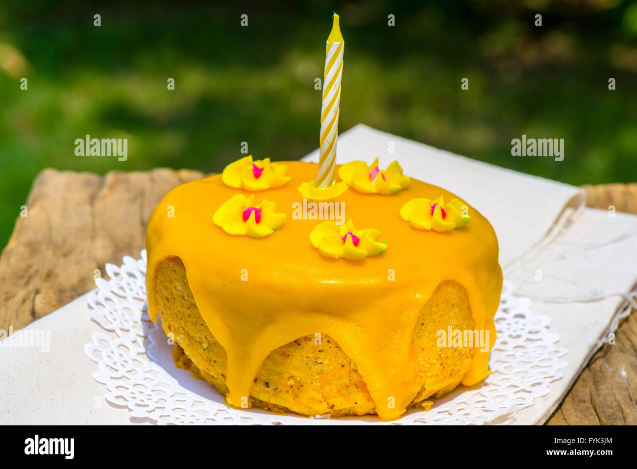 Yellow Motif One Year Old Birthday Cake Stock Photo - Alamy