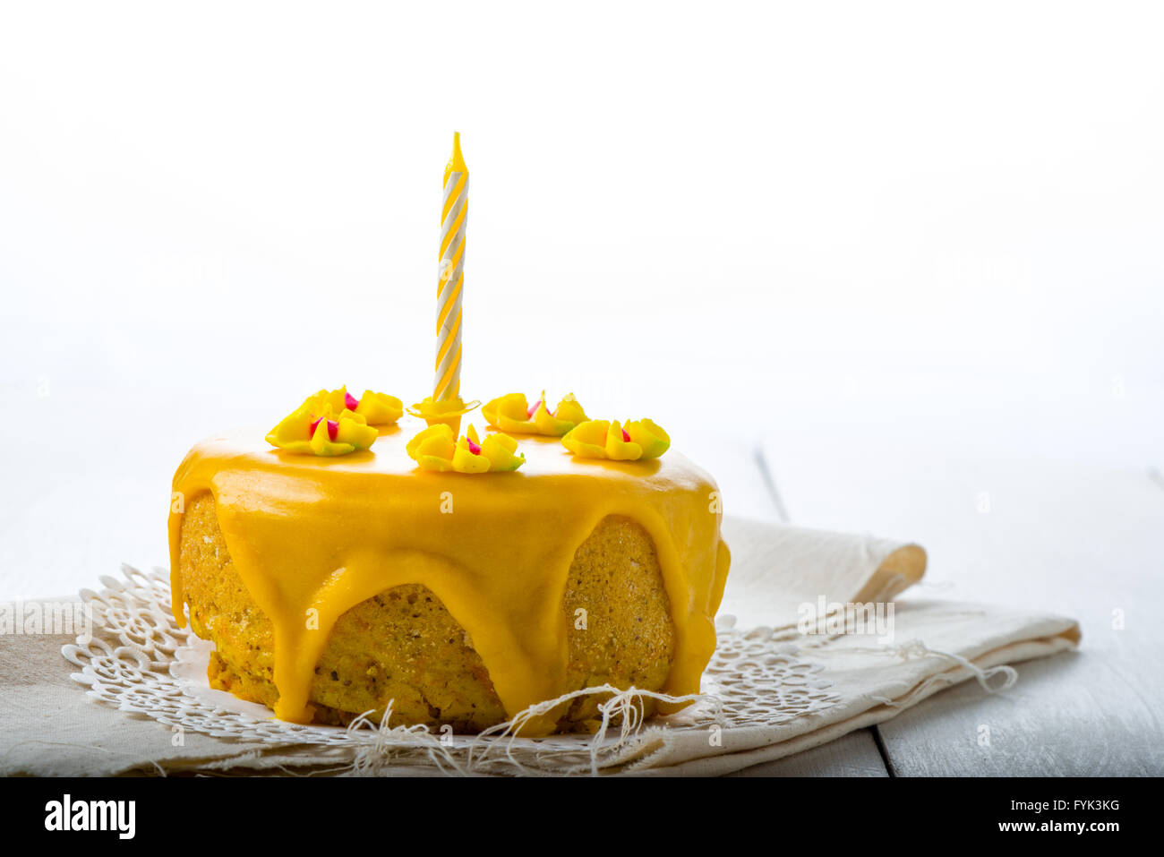 Yellow Birthday Cake Stock Photo - Alamy