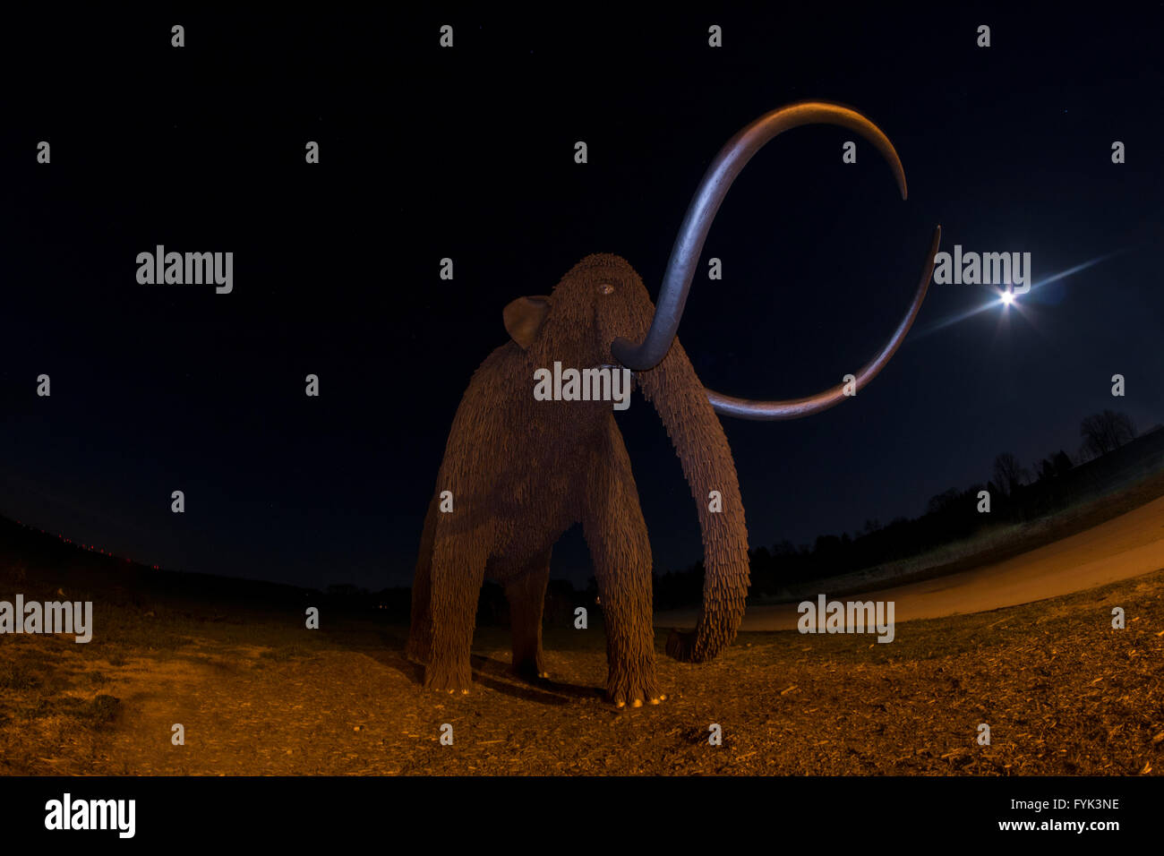 Metal Woolly Mammoth statue at Horicon Marsh Wisconsin during full moon