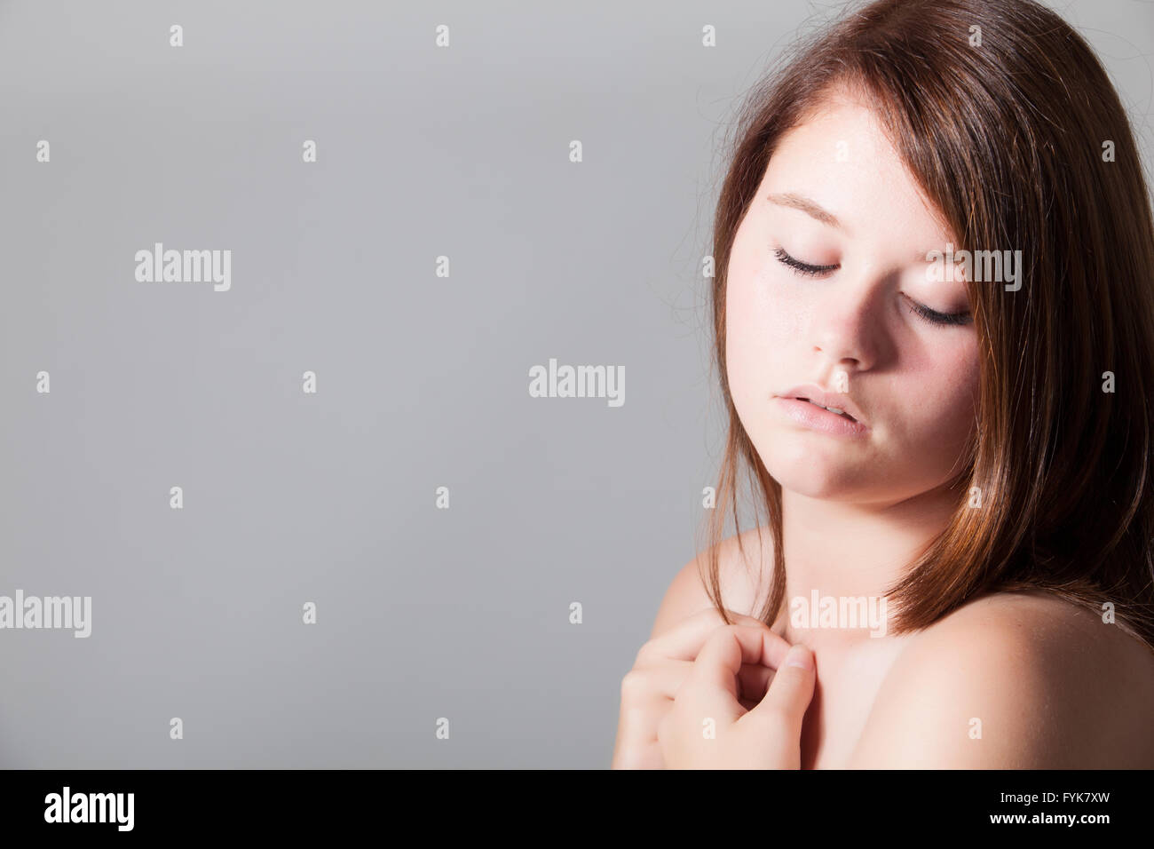 Pretty woman with closed eyes Stock Photo - Alamy