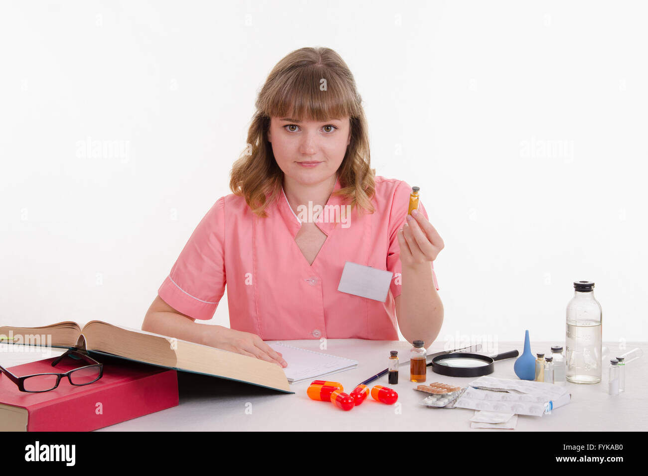 Pharmacy studies properties of powder on book Stock Photo Alamy
