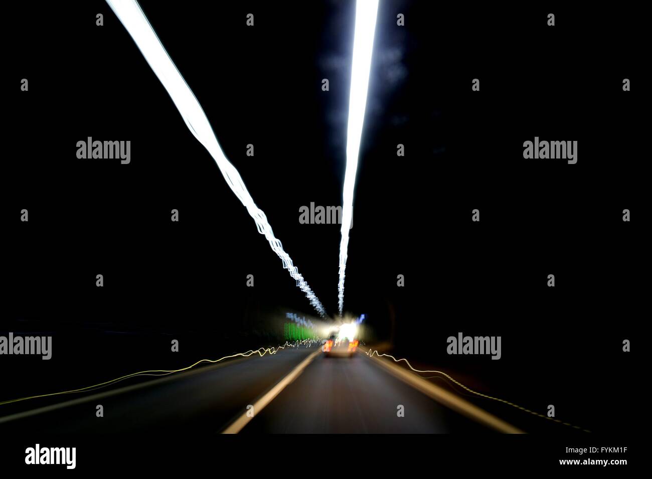 Driving through a tunnel with a car, Germany, near the city of Gräfenroda, 26.April 2016. Photo: Frank May Stock Photo