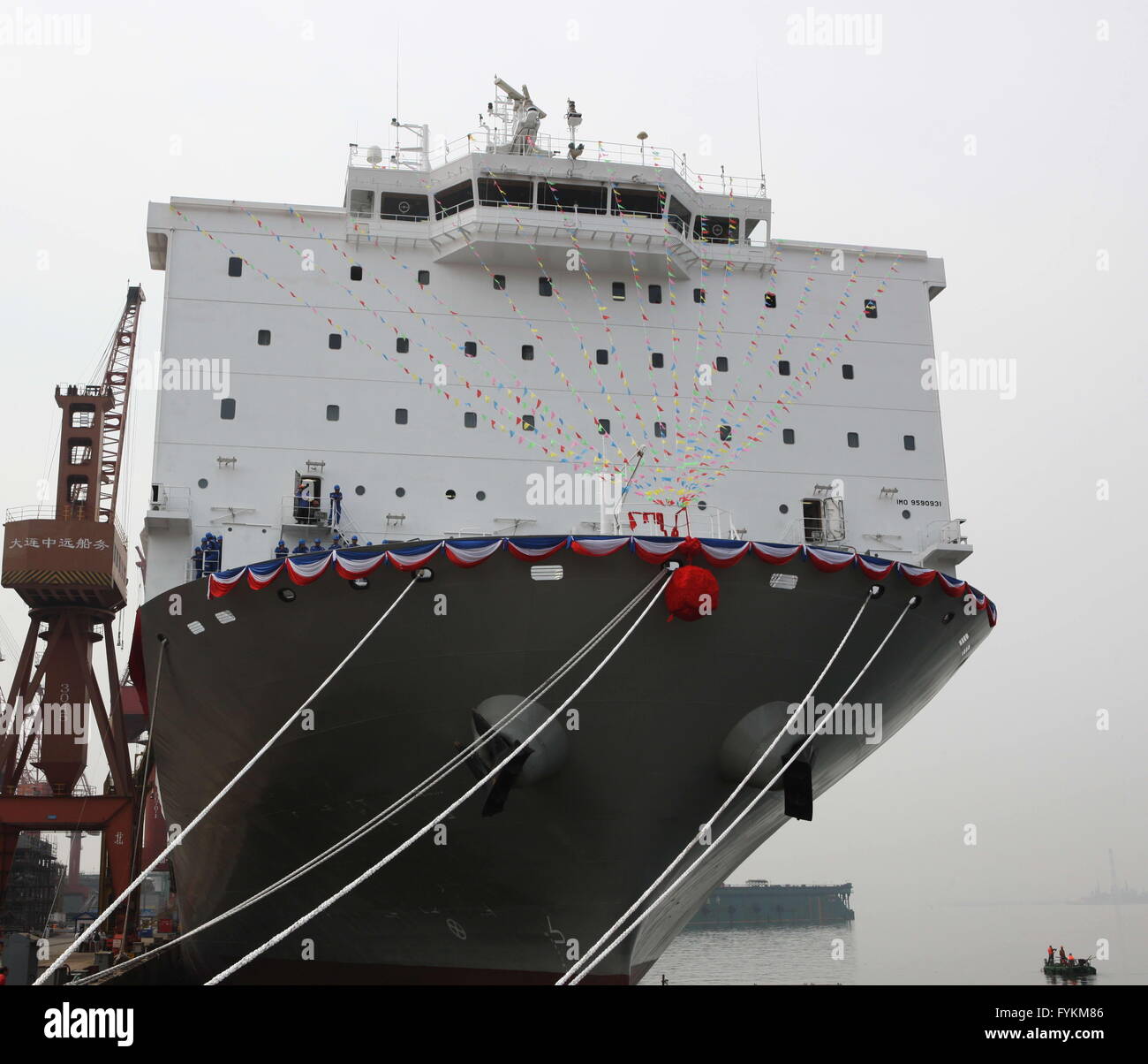 (160427) -- DALIAN, April 27, 2016 (Xinhua) -- Photo taken on April 27, 2016 shows the livestock carrier Ocean Shearer at its unveiling ceremony in Dalian, northeast China's Liaoning Province. The ship is 189.5 meters long, 31.1 meters wide and  and 24.33 meters in moulded depth. Constructed by Cosco Shipyard in Dalian, it is the current largest livestock carrier built in a Chinese shipyard, which could accommodate about 17,000 live cattle. (Xinhua/Ding Hongfa) (zhs) Stock Photo