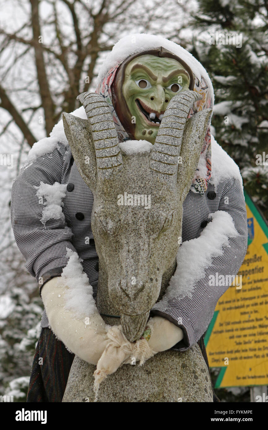 A witch figure sits on a billygoat, the emblem of the area, in Hohegeiss, Germany, 27 April 2016. Photo: MATTHIAS BEIN/dpa/lah/lni  - NO WIRE SERVICE - Stock Photo