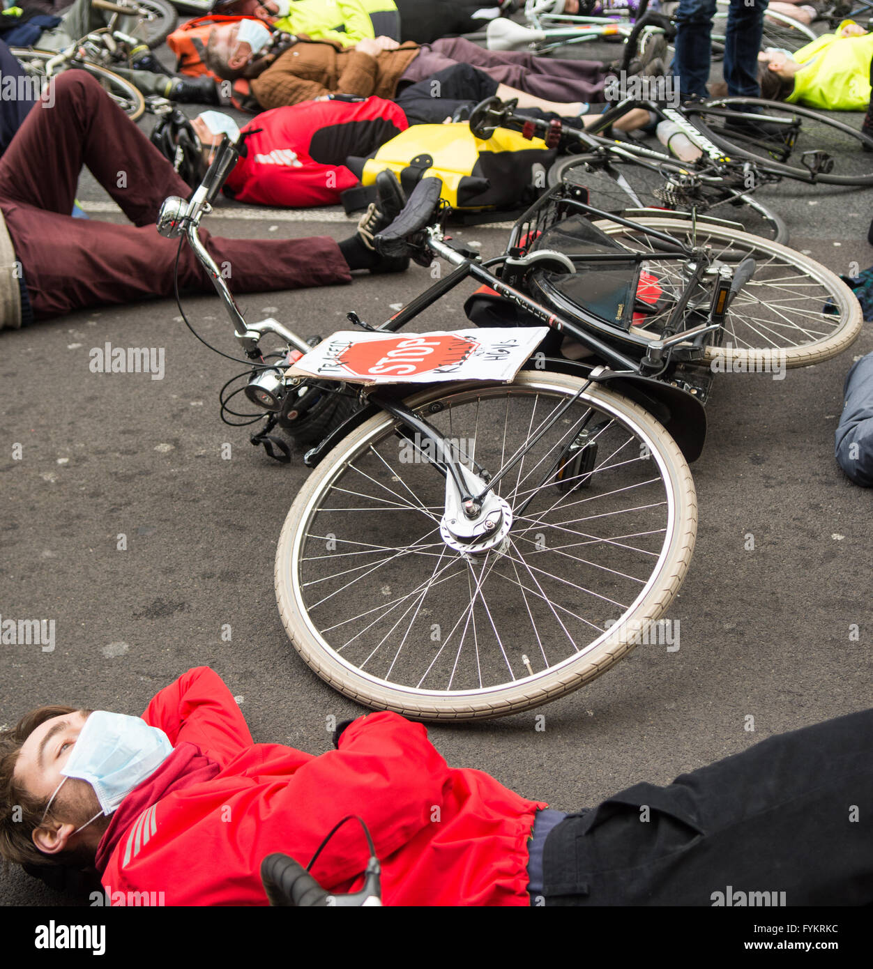 London, UK. 27th Apr, 2016. Protesters stage a 'die in' demonstration to call for tougher action on air pollution outside the UK government's Department for Transport on Horseferry Road in Westminster. Credit:  Joe Dunckley/Alamy Live News Stock Photo
