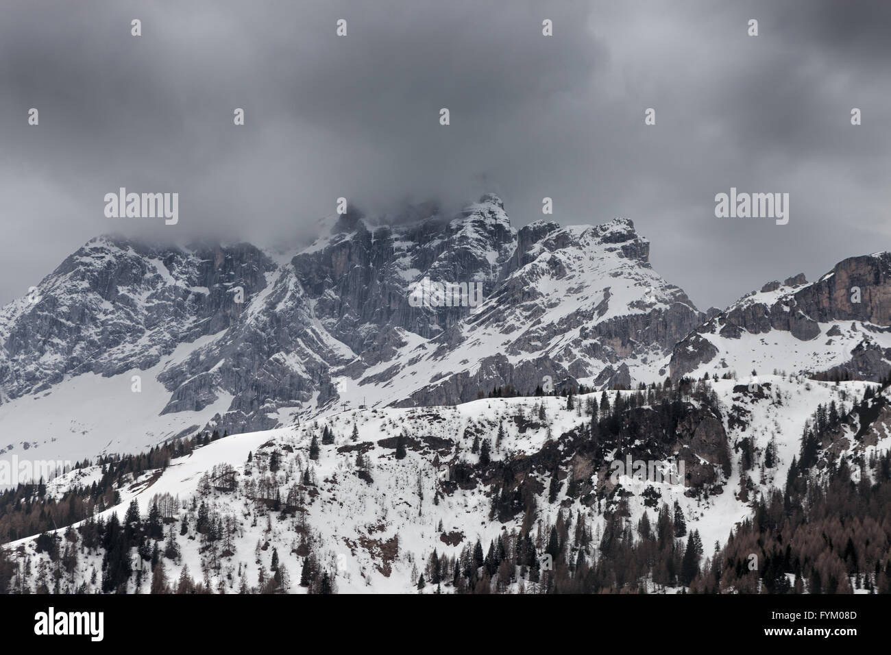 Cloudy spring weather in Dolomites mountains Stock Photo