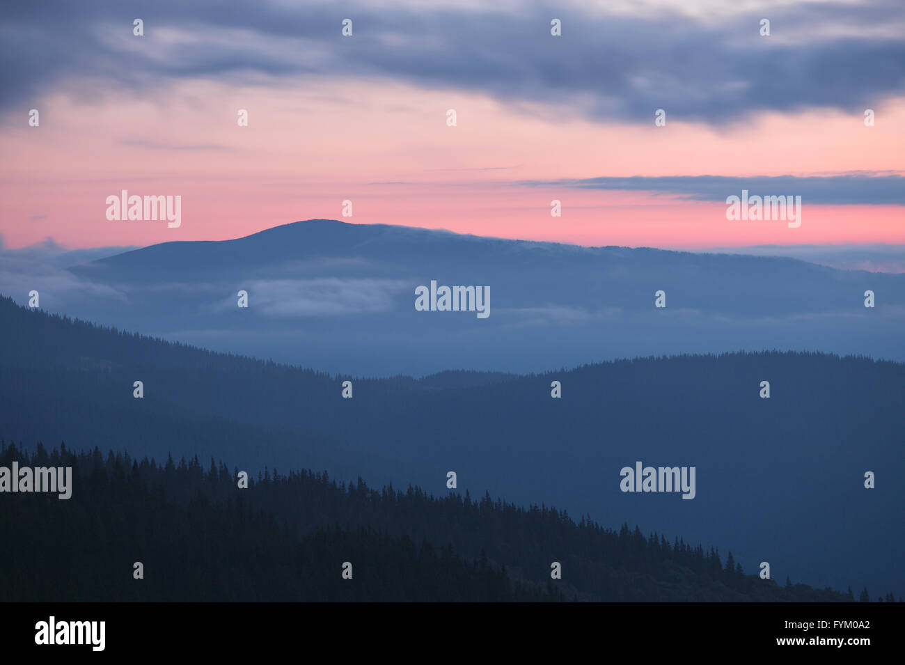 Carpathian mountains silhoutte at sunrise Stock Photo