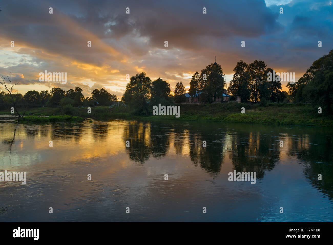 Beautiful summer sunset in the river Stock Photo - Alamy