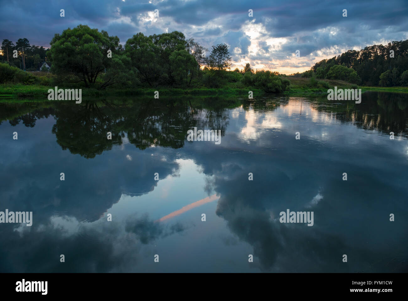 Beautiful summer sunset on the river Stock Photo - Alamy