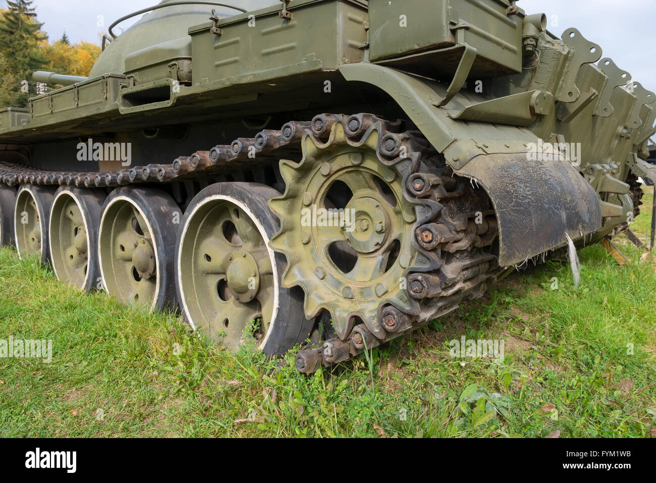 The caterpillar of old tank buried in the ground Stock Photo Alamy
