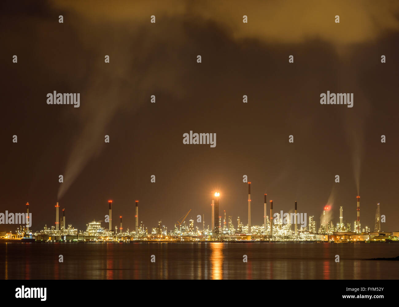 Oil refinery at night in Singapore Stock Photo