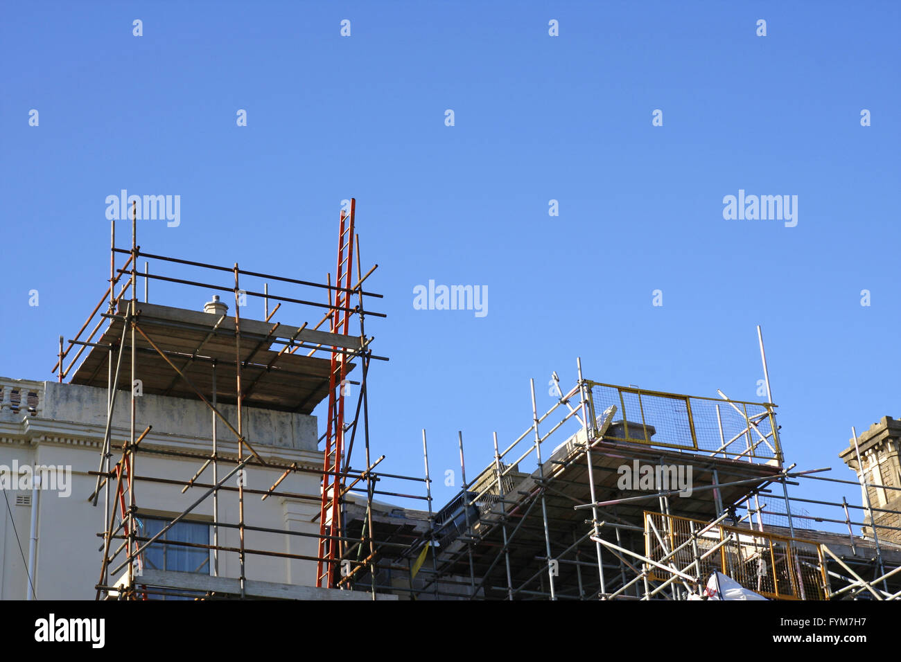 Scaffolding on outside of large house Stock Photo - Alamy