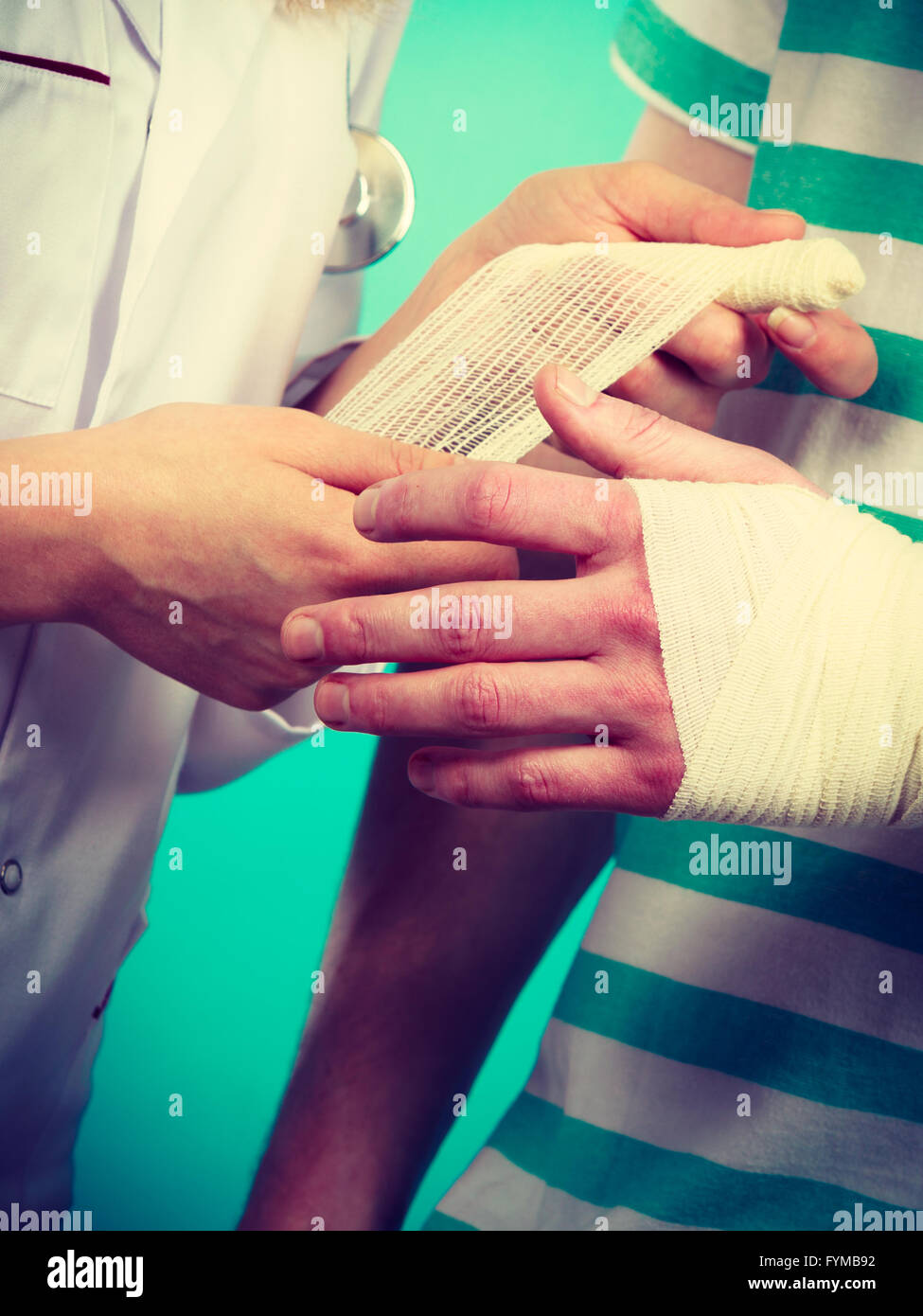 Healthcare and protection. Young man with broken hand sprained wrist