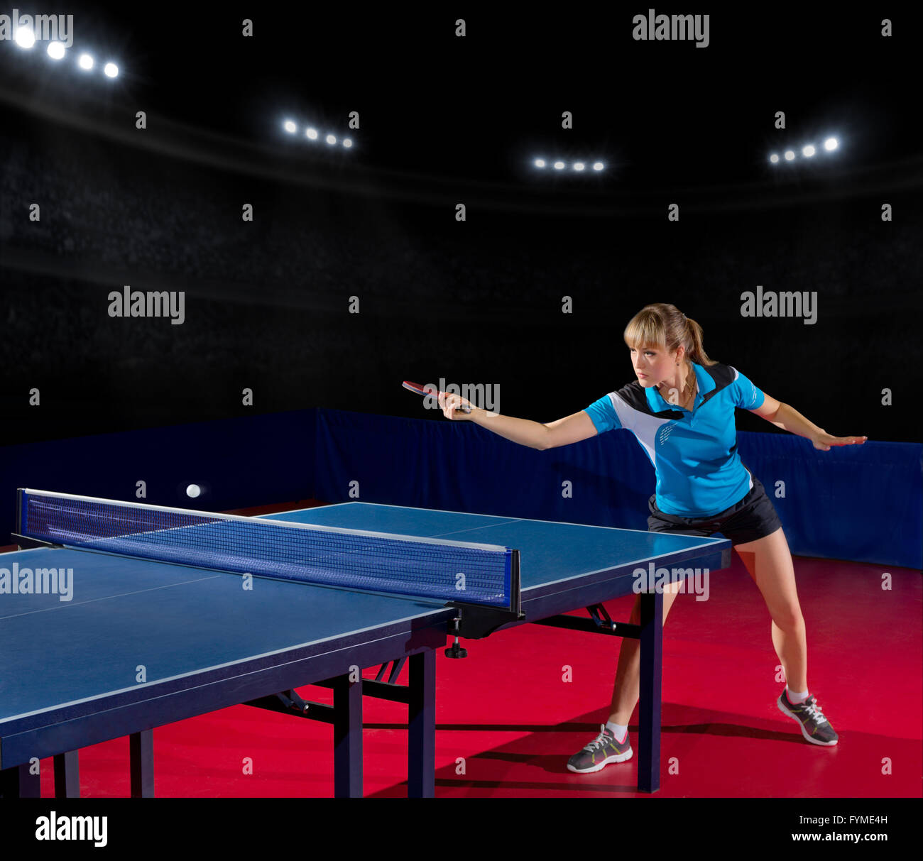 Young girl table tennis player at sports hall Stock Photo