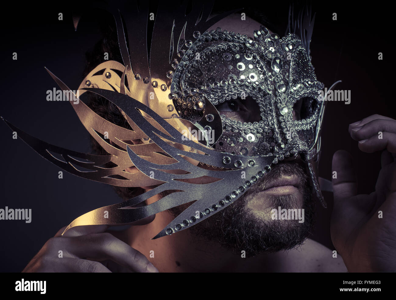 Fear, bearded man with silver mask style. Mystery and