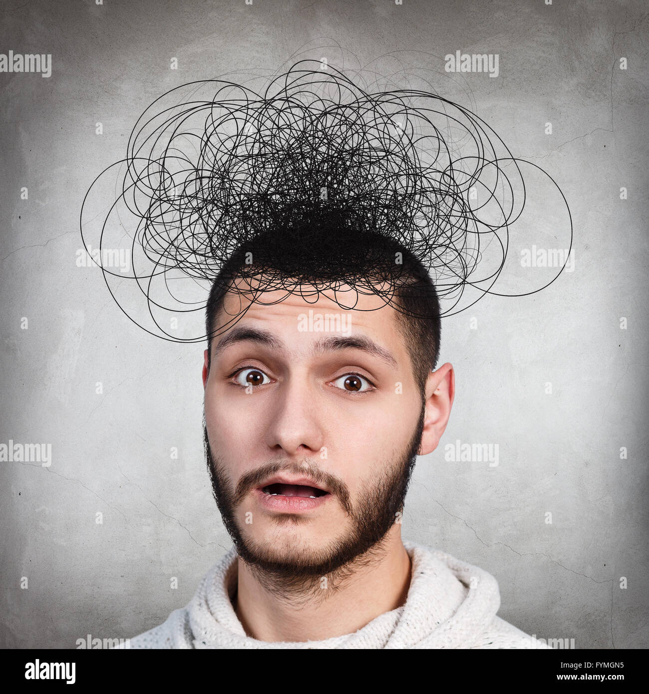 Man with confusing tangle of thoughts Stock Photo