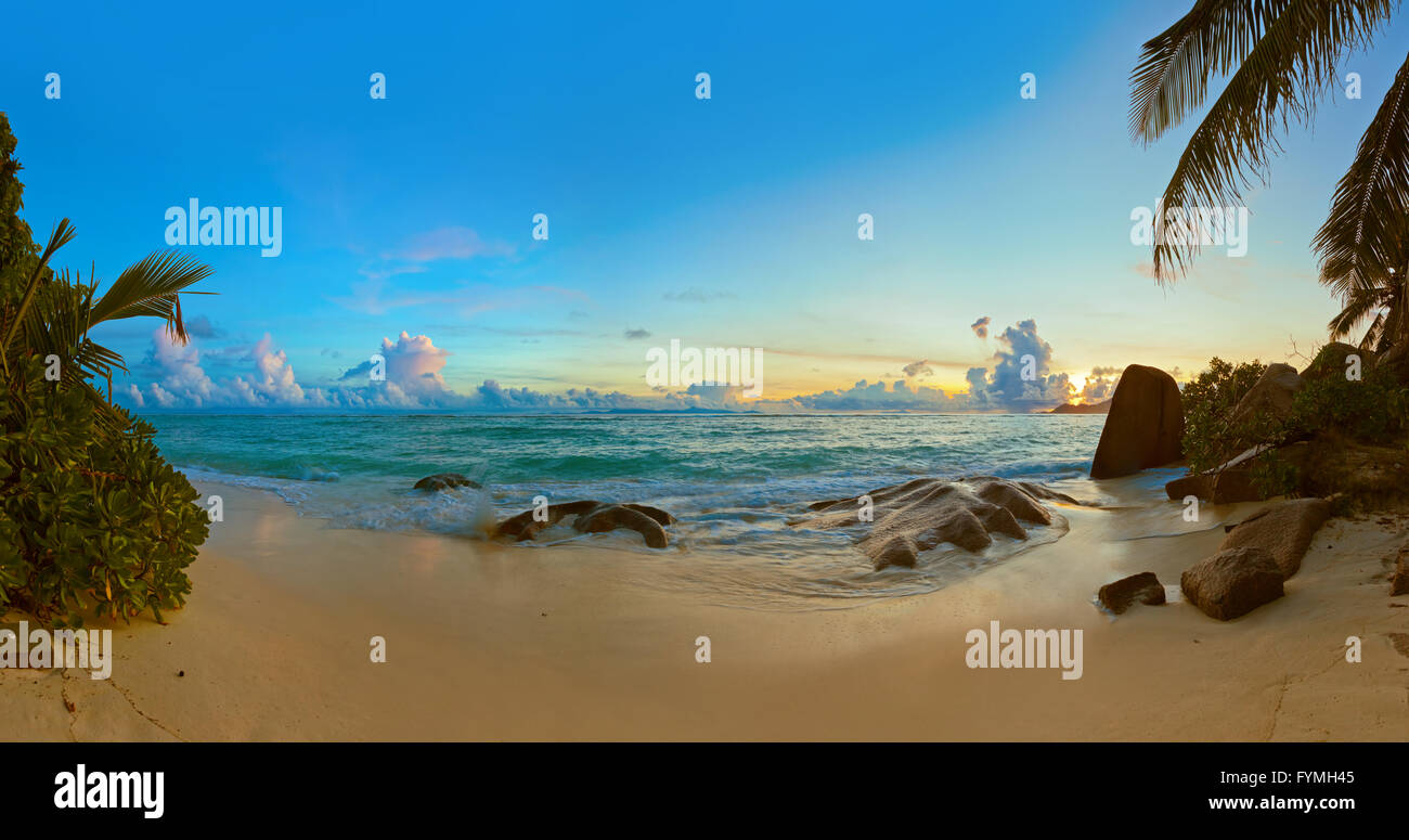 Sunset on beach Source D'Argent at Seychelles Stock Photo - Alamy