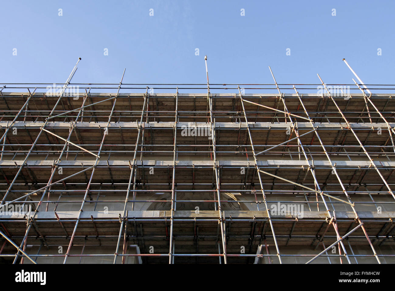 Scaffolding on a large building Stock Photo - Alamy