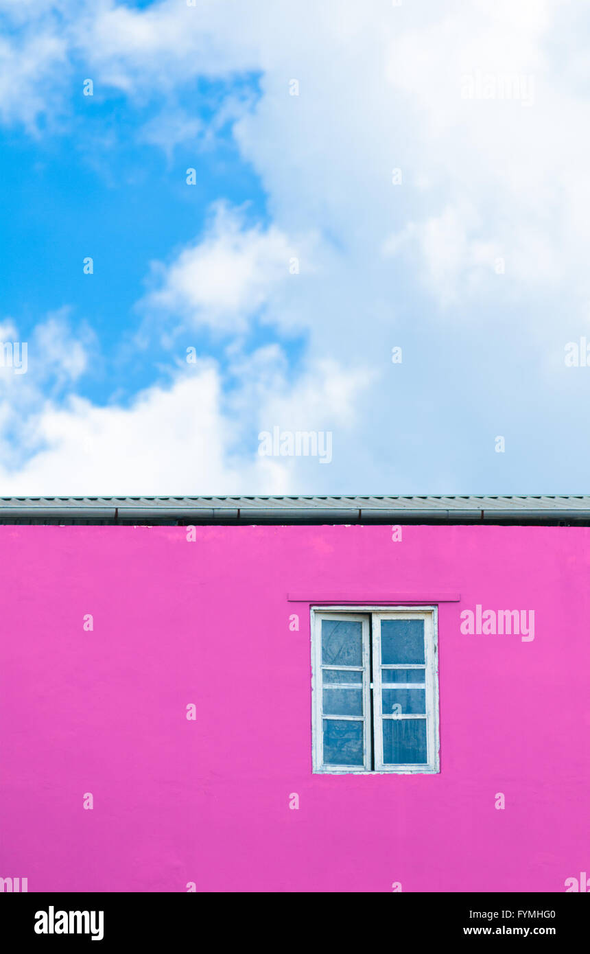 window in pink wall Stock Photo