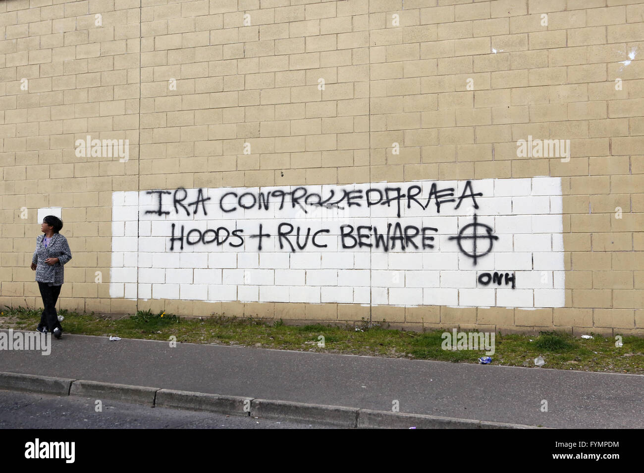 Fresh graffiti seen on a wall in the Catholic nationalists Springfield Road area of west Belfast, warns the public that this part of the area is controlled by the IRA. The Irish Republican Army (IRA) is any of several armed movements in Ireland in the 20th and 21st centuries dedicated to Irish republicanism, the belief that all of Ireland should be an independent republic. It was also characterised by the belief that political violence was necessary to achieve that goal. The original Irish Republican Army formed by 1917 from those Irish Volunteers who refused to enlist in the British Army duri Stock Photo