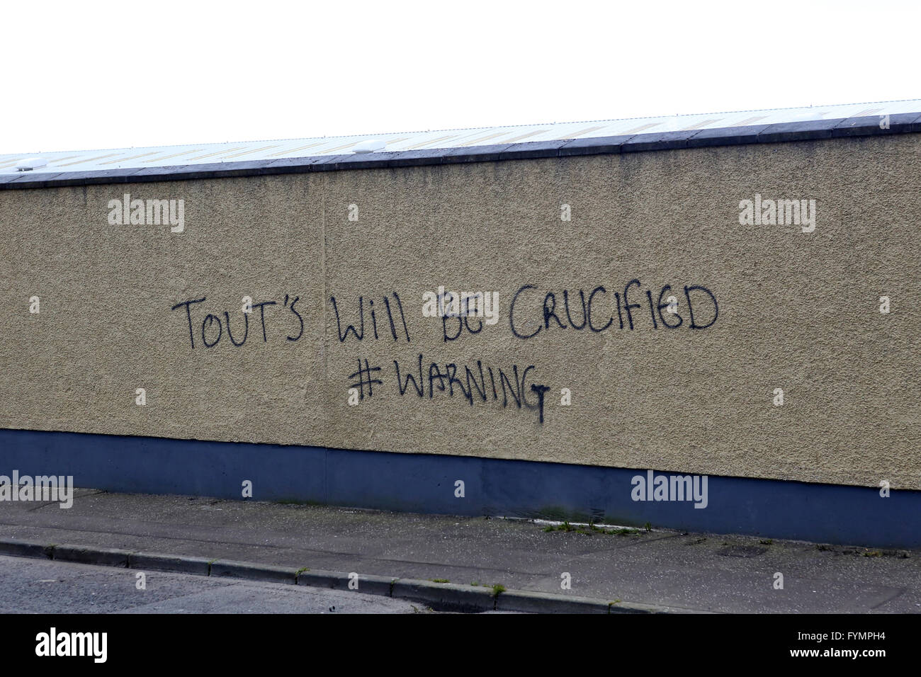 Fresh graffiti seen on a wall in the Catholic nationalists Springfield