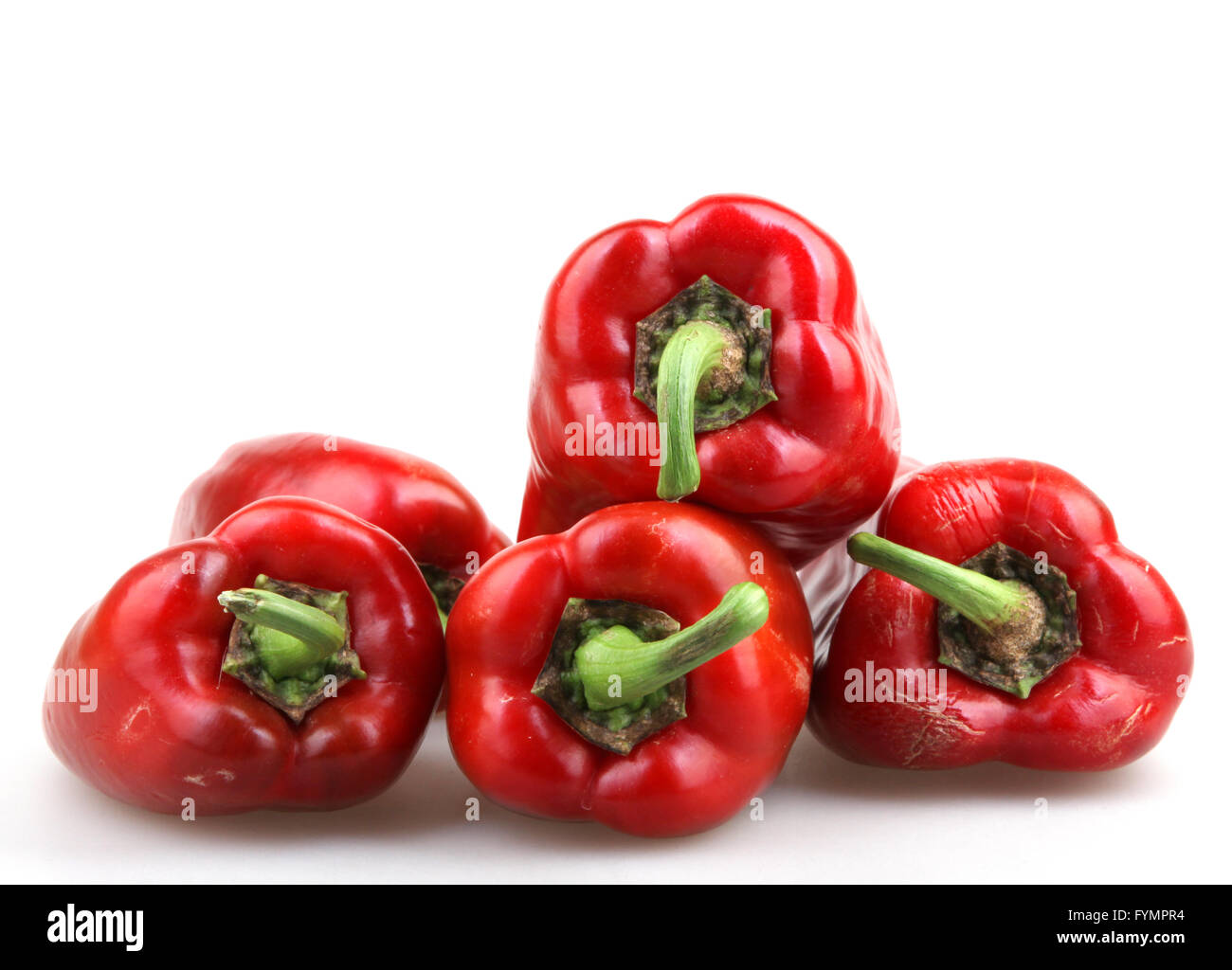 Red chilli peppers on white background Stock Photo - Alamy