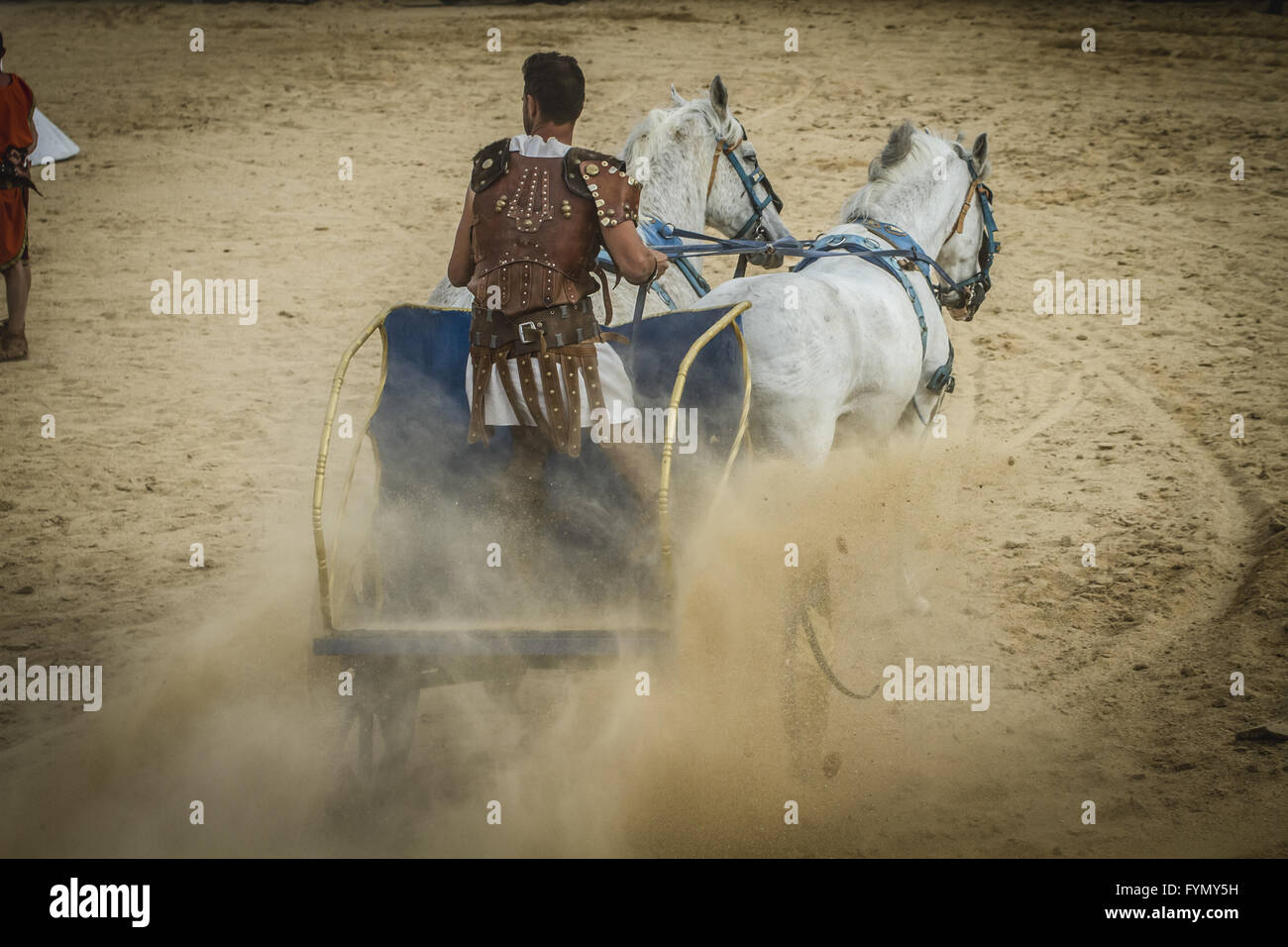 Empire, chariot race in a Roman circus, gladiators and slaves fighting Stock Photo
