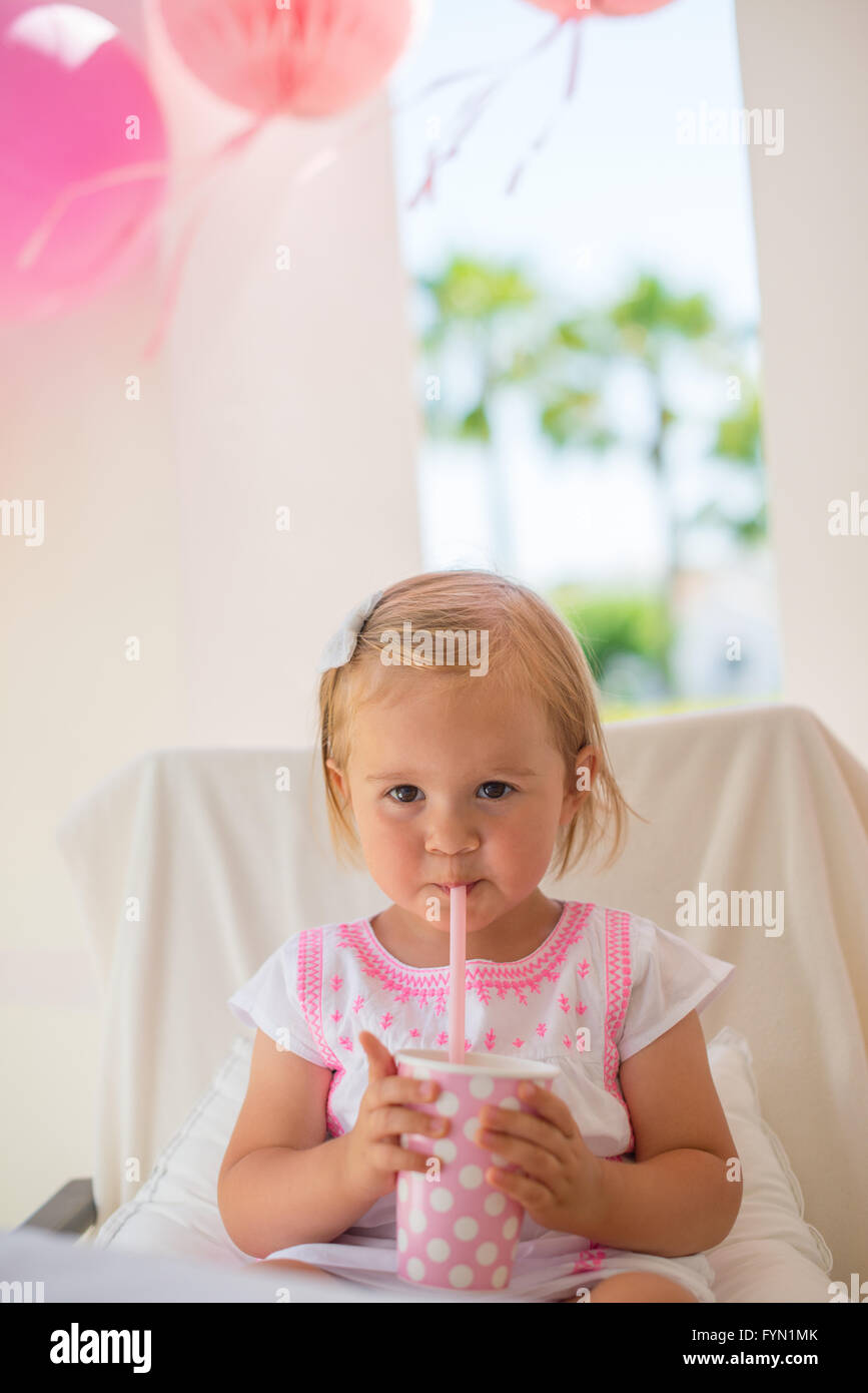 Little Toddler Drinking Juice From Paper Cup Stock Photo Alamy