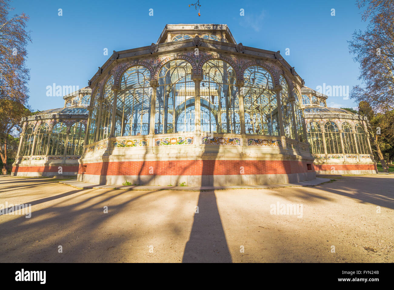 The Crystal Palace (Palacio de Cristal) is located in the Retiro park in Madrid, Spain. It is a metal structure used for exposit Stock Photo