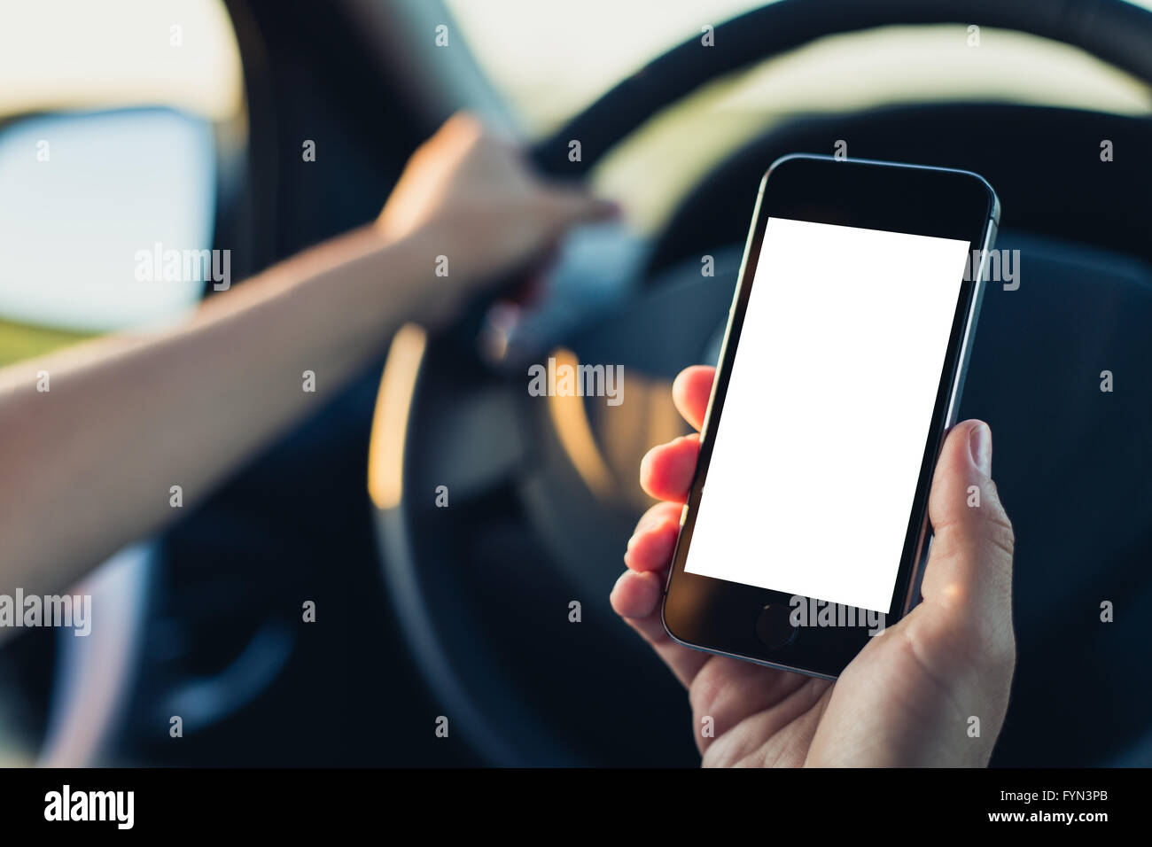 Woman using phone in the car Stock Photo Alamy