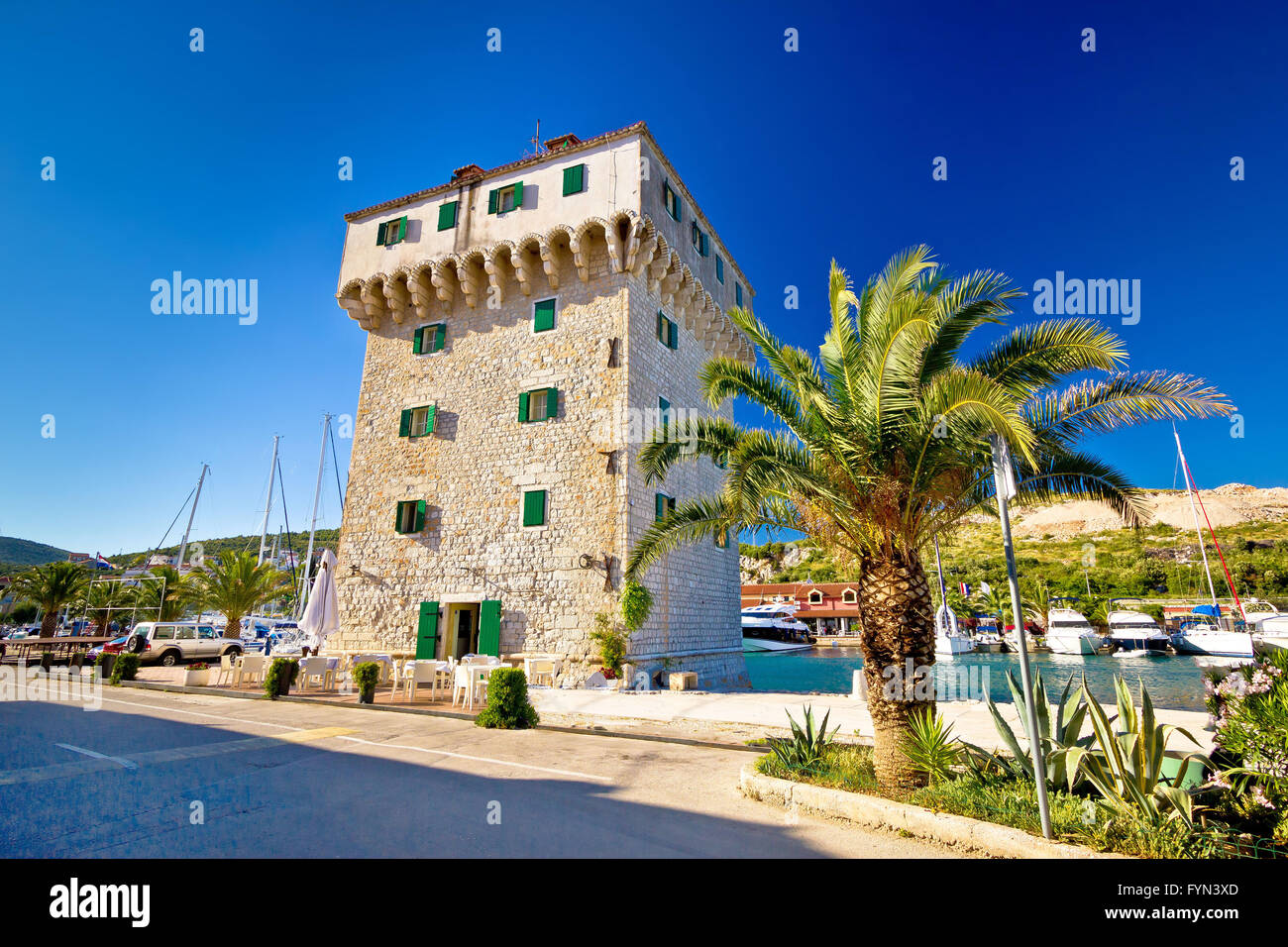 Stone tower in adriatic town of Marina Stock Photo