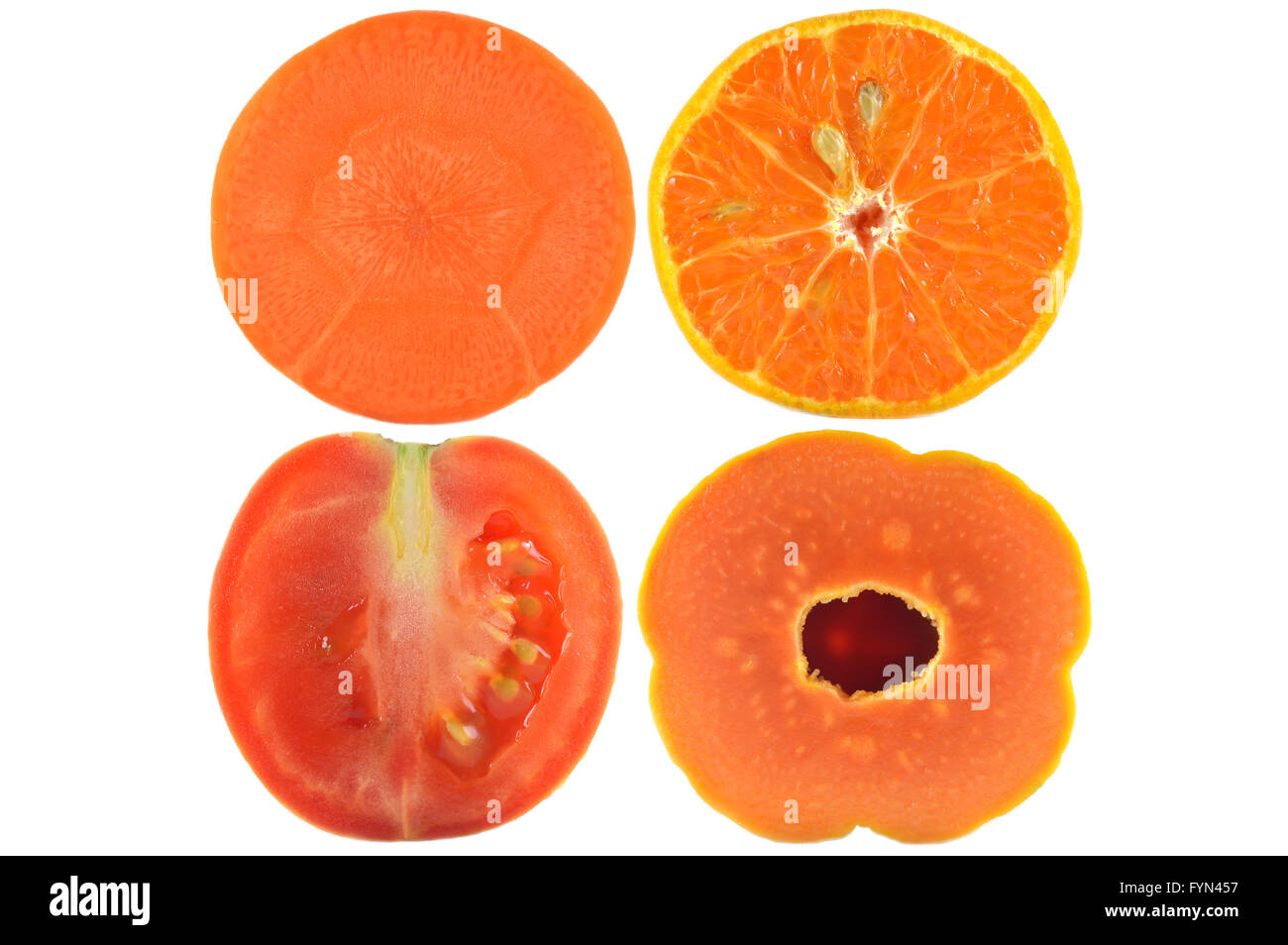 Halves of fruit and vegetable on white background Stock Photo