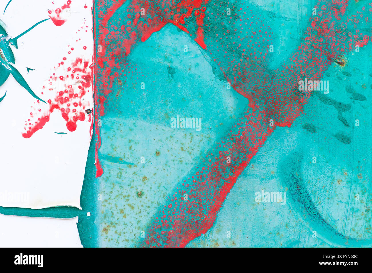 Abstract of peeling white paint on a turquoise background with red ...
