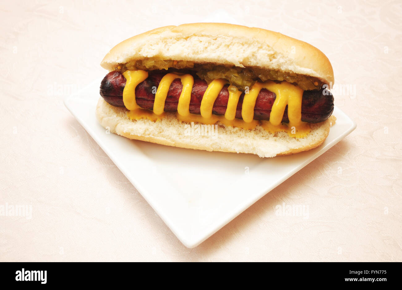 Hot Dog Served with Yellow Mustard & Pickled Relish Stock Photo Alamy