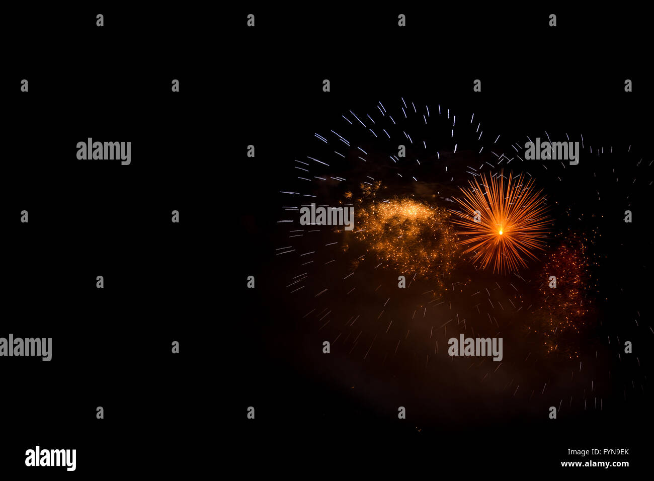 Firework celebration in dark night sky Stock Photo - Alamy